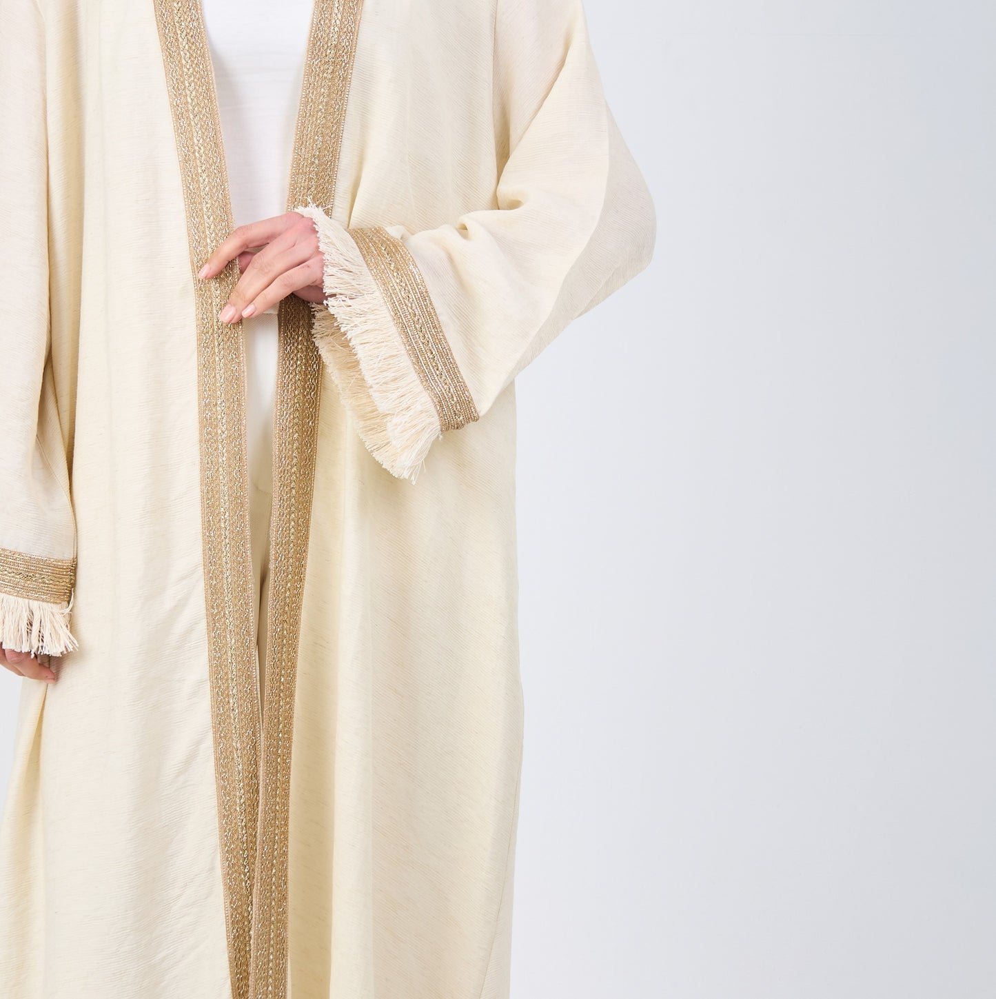 Gold embroidered caftan with tassel sleeves