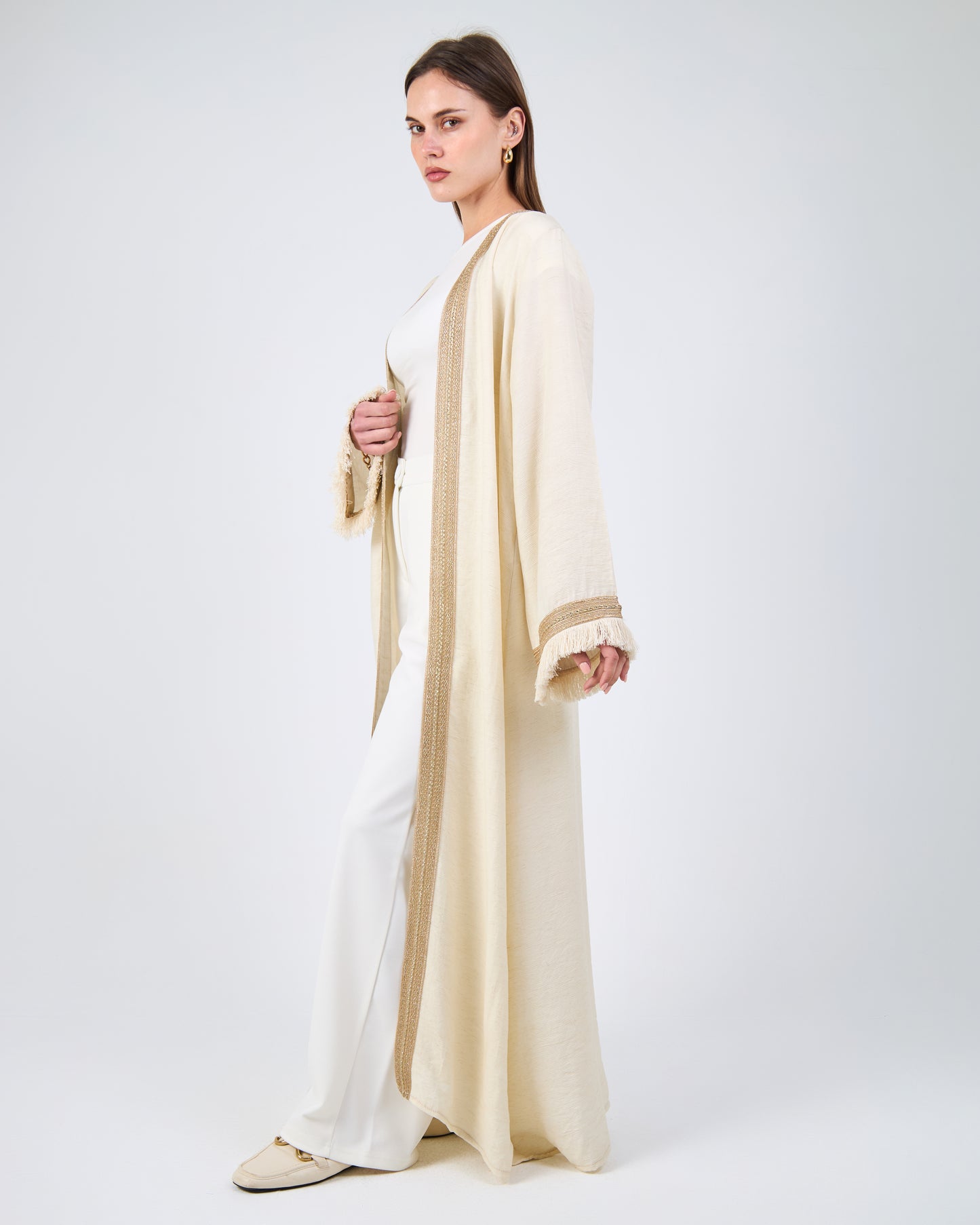 Gold embroidered caftan with tassel sleeves